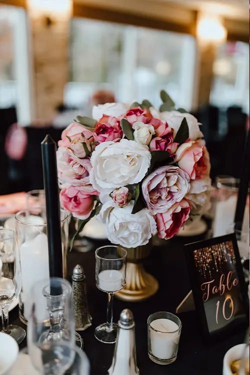 Floral arrangement on a table at a wedding reception